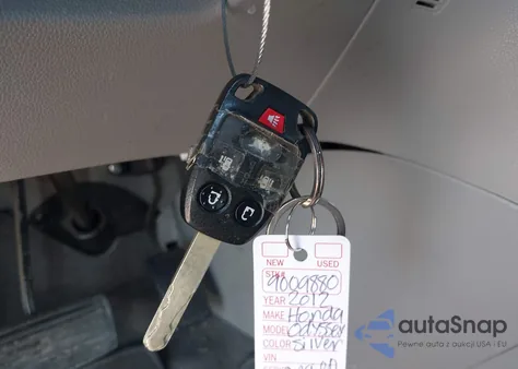 2012 Honda Odyssey Ex-L z USA, uszkodzony, nr VIN 5FNRL5H64CB038986